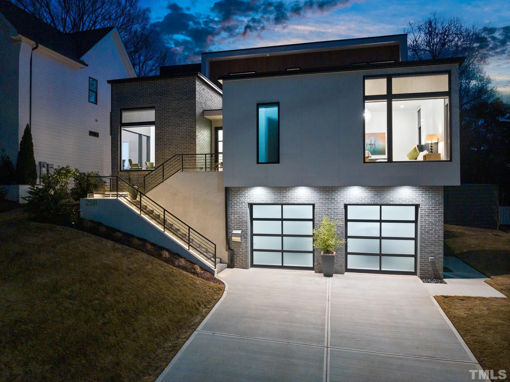 2511 Stafford Avenue Raleigh, NC 27607 - Photo 69 of 74 a front view of a house with a yard