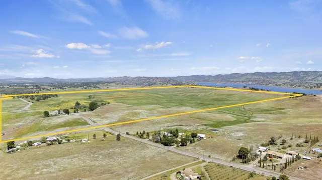 a view of an ocean and a mountain