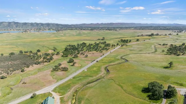 a view of an ocean and a mountain