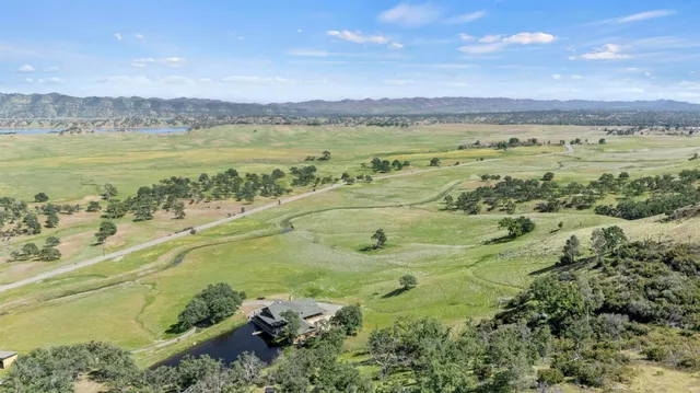 a view of an ocean and a mountain
