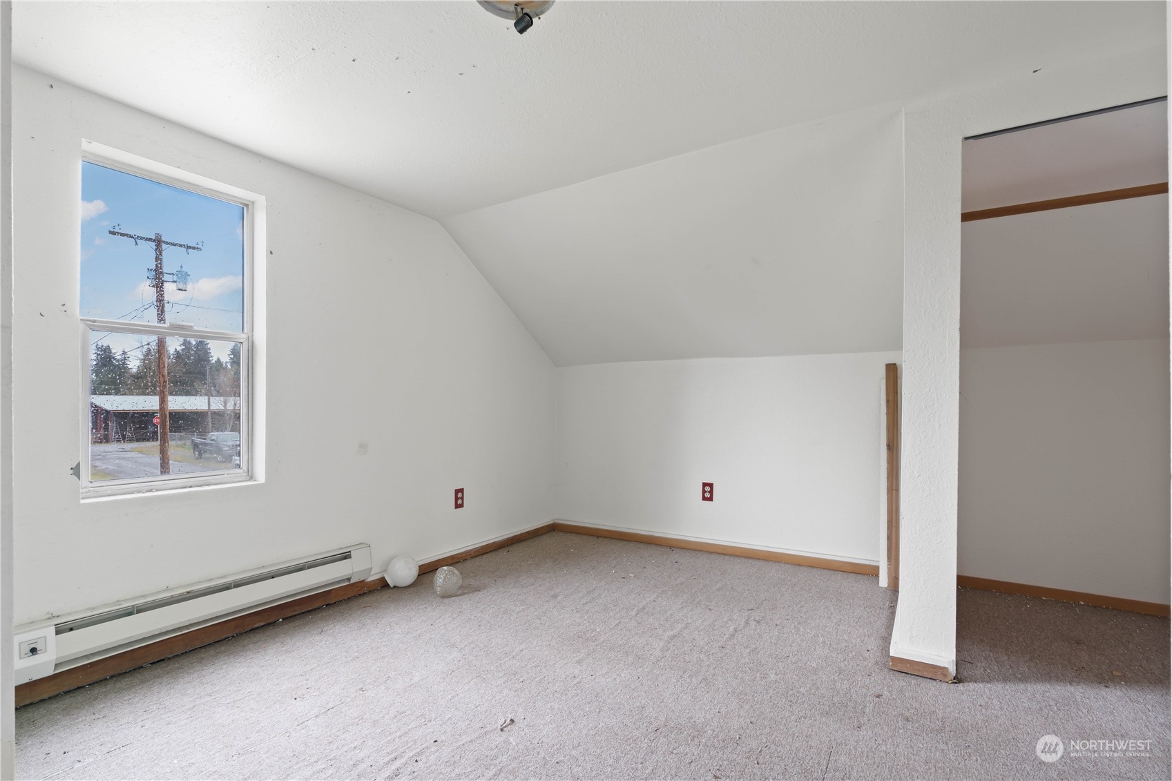 322 4th Street Roy, WA 98580 - Photo 12 of 29 a view of an empty room with a window