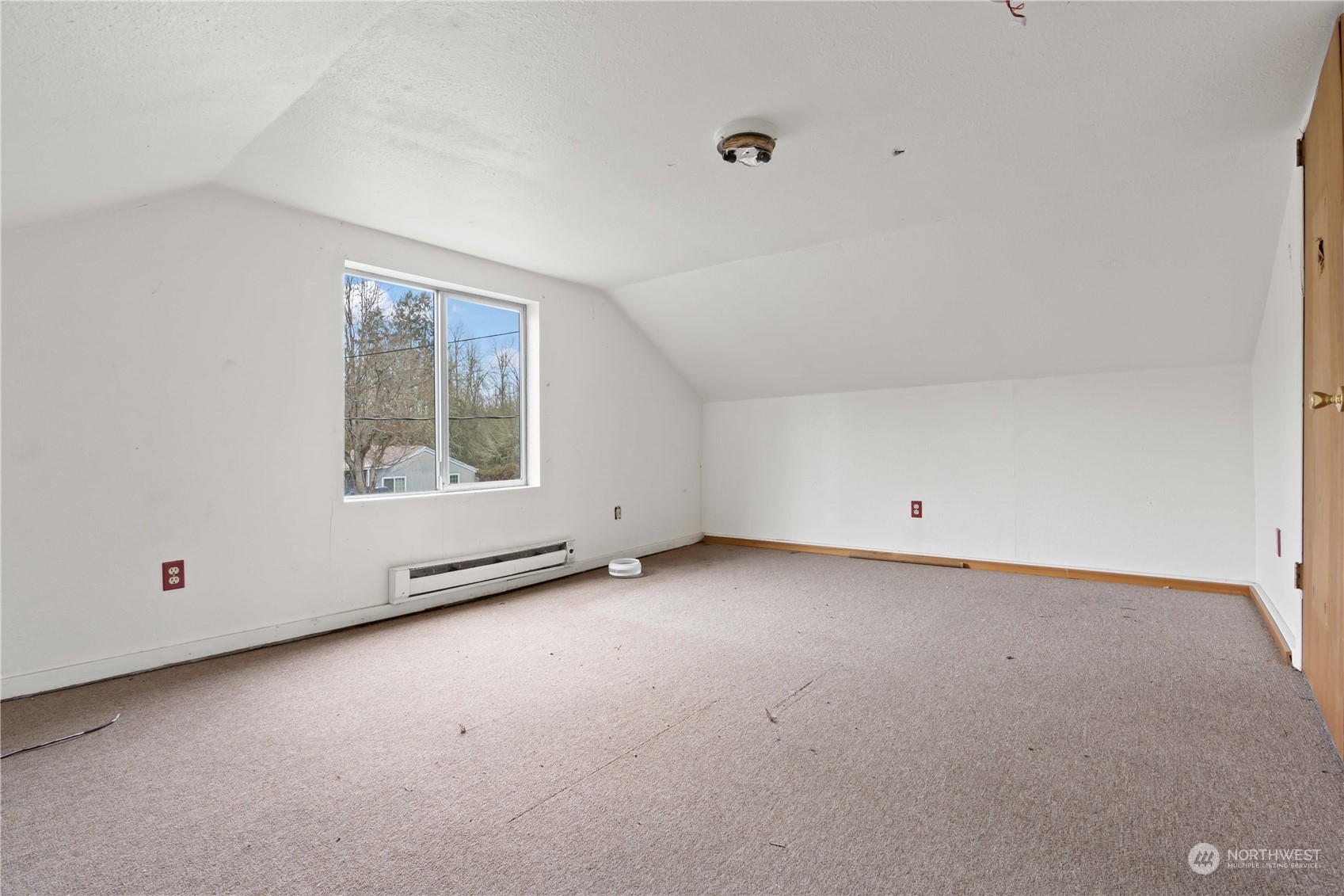 322 4th Street Roy, WA 98580 - Photo 15 of 29 a view of an empty room with a window