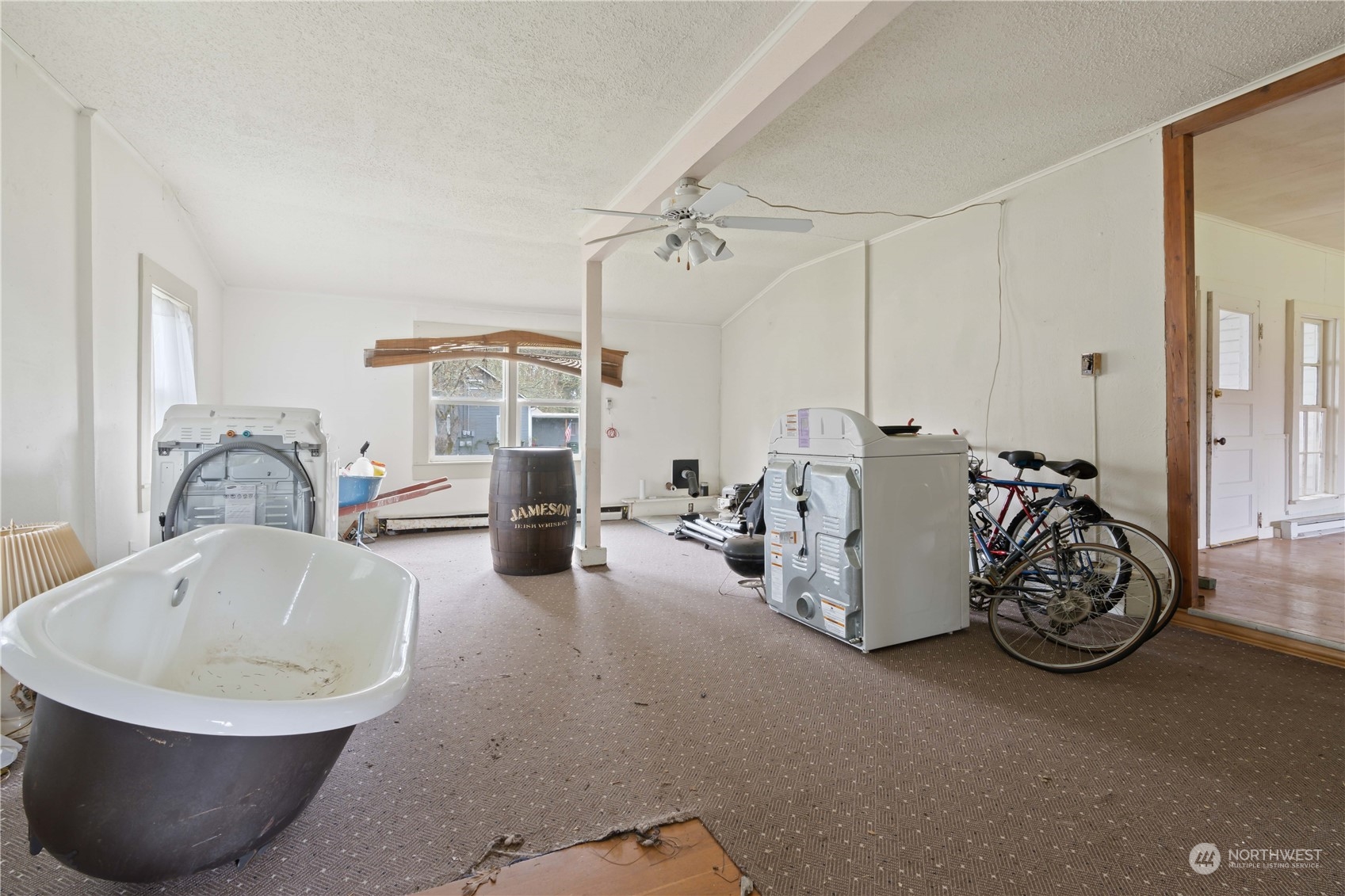322 4th Street Roy, WA 98580 - Photo 16 of 29 a view of a livingroom with furniture and windows