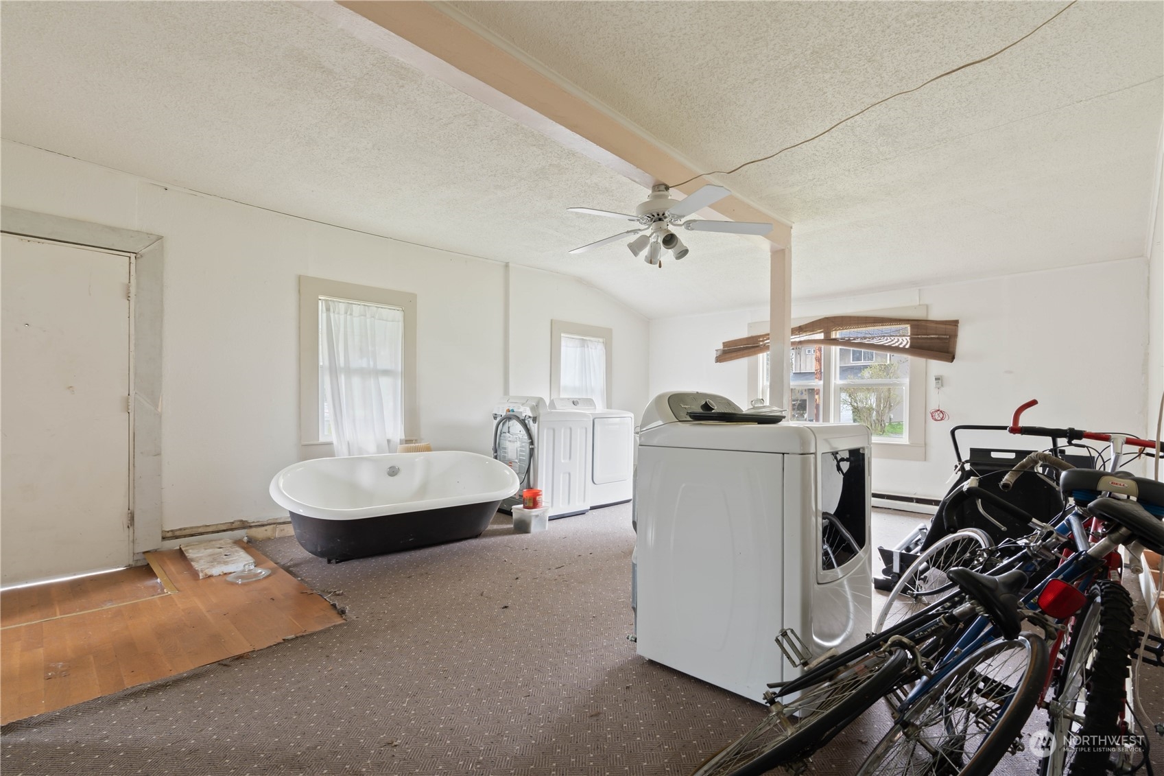 322 4th Street Roy, WA 98580 - Photo 18 of 29 a workspace with furniture and storage