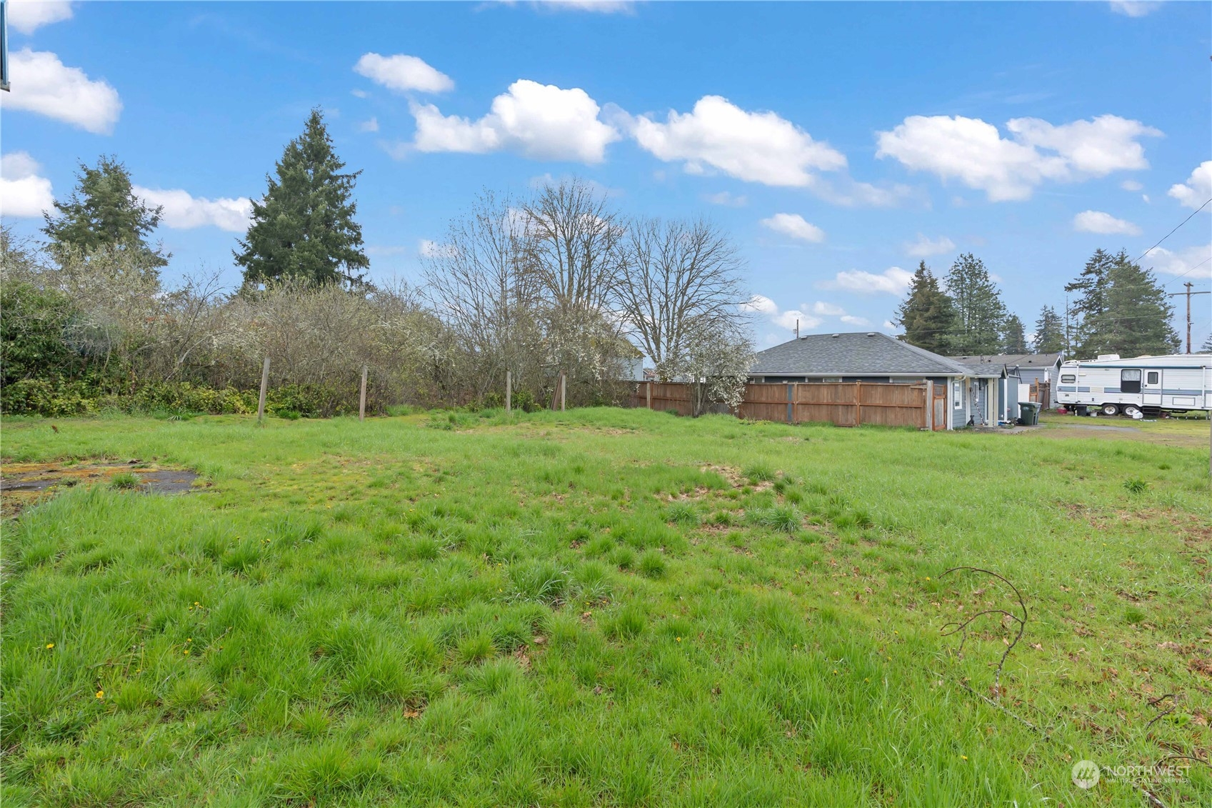 322 4th Street Roy, WA 98580 - Photo 25 of 29 a view of a house with a big yard