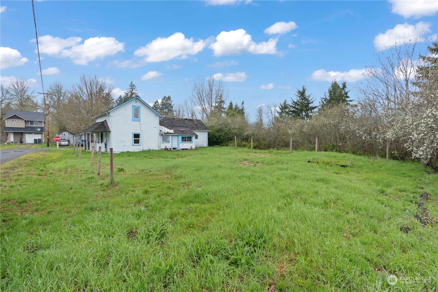 322 4th Street Roy, WA 98580 - Photo 26 of 29 a view of a house with a yard
