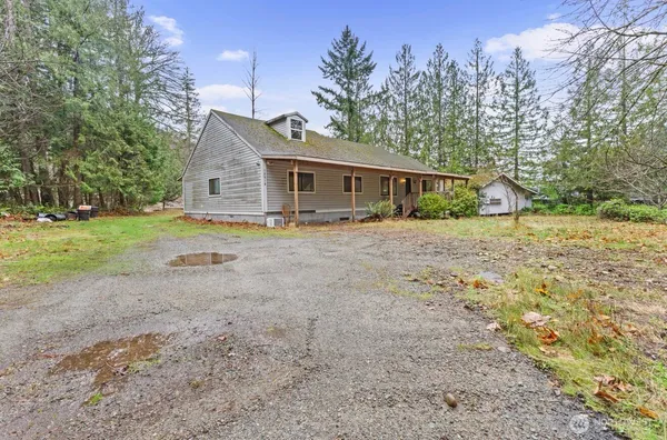 a house view with a garden space