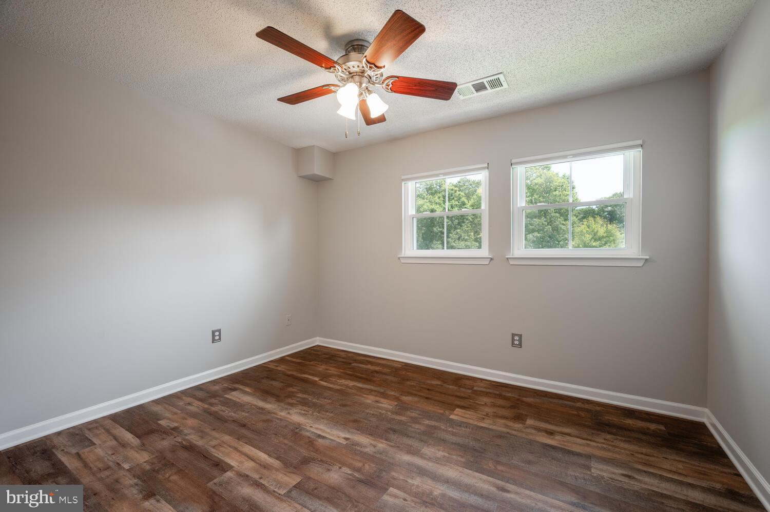 12024 Taliesin Place, Unit 33 Reston, VA 20190 - Photo 16 of 32 an empty room with a window