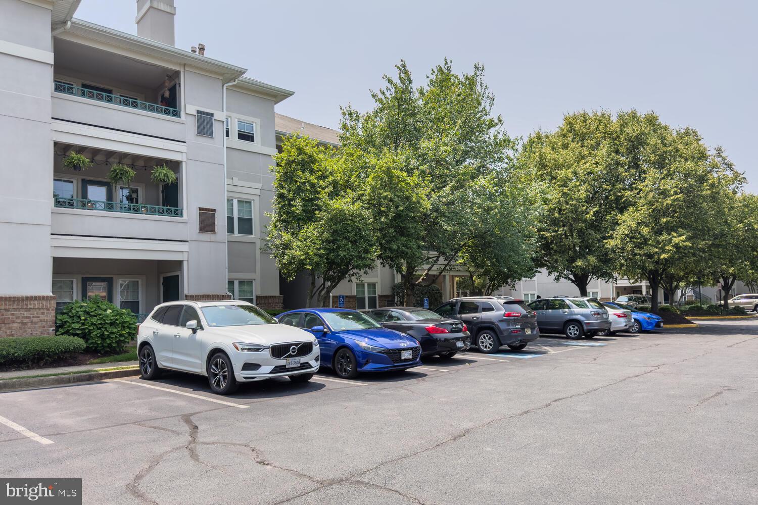 12024 Taliesin Place, Unit 33 Reston, VA 20190 - Photo 31 of 32 a car parked in front of a house