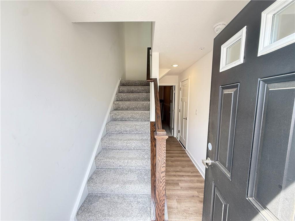 174 Lockheed Drive Coraopolis, PA 15108 - Photo 2 of 15 a view of a hallway with staircase