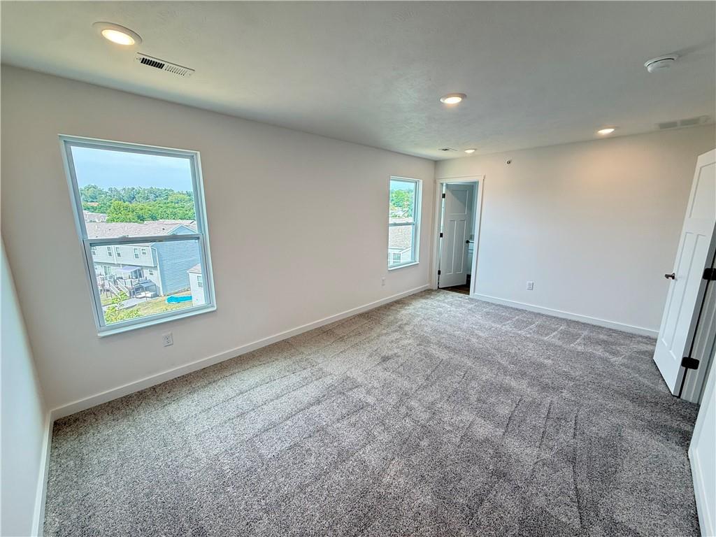 174 Lockheed Drive Coraopolis, PA 15108 - Photo 10 of 15 a view of an empty room with a window
