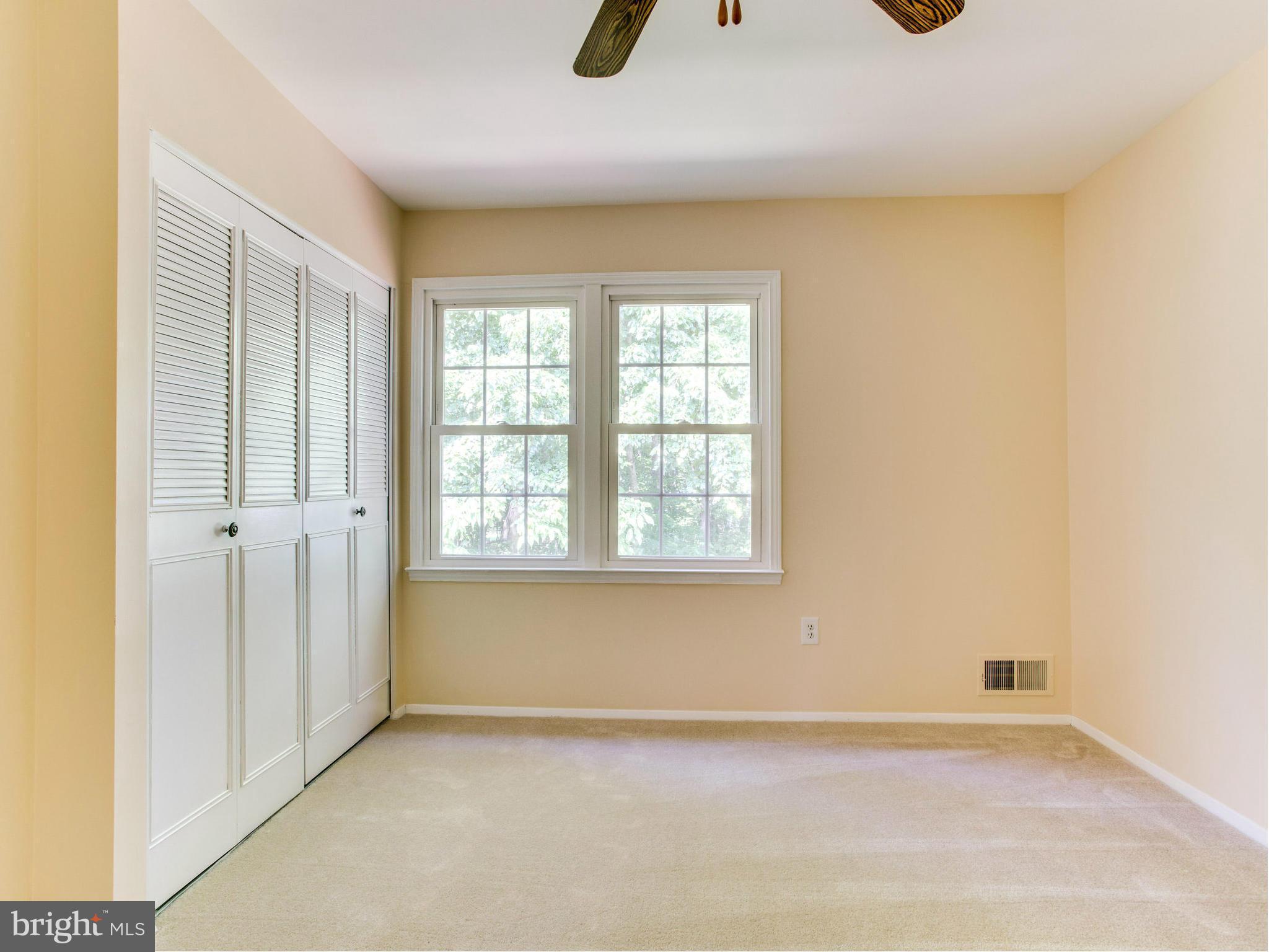 2308 St Bedes Court Reston, VA 20191 - Photo 22 of 30 an empty room with windows