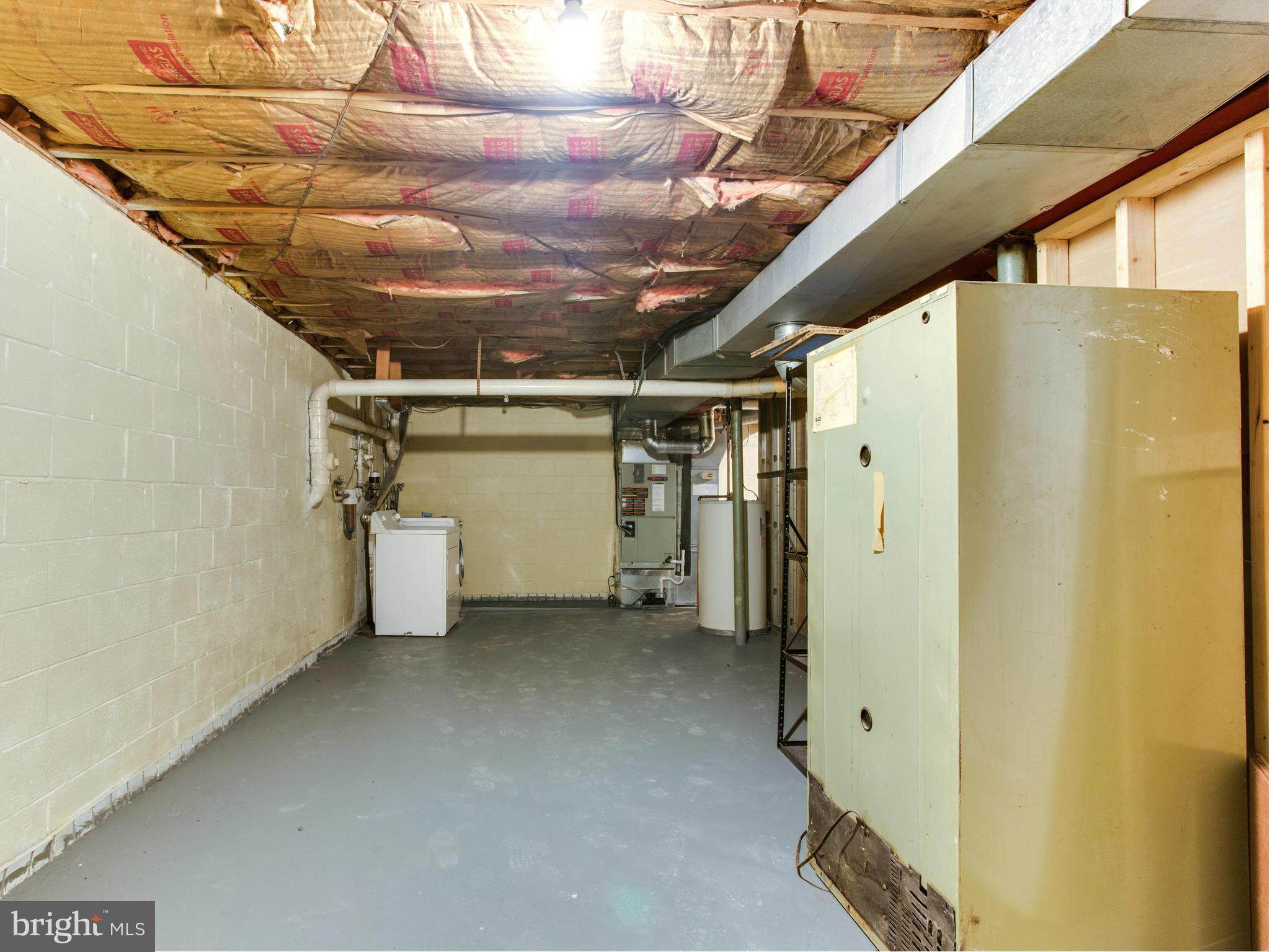 2308 St Bedes Court Reston, VA 20191 - Photo 27 of 30 a view of a refrigerator in an empty room