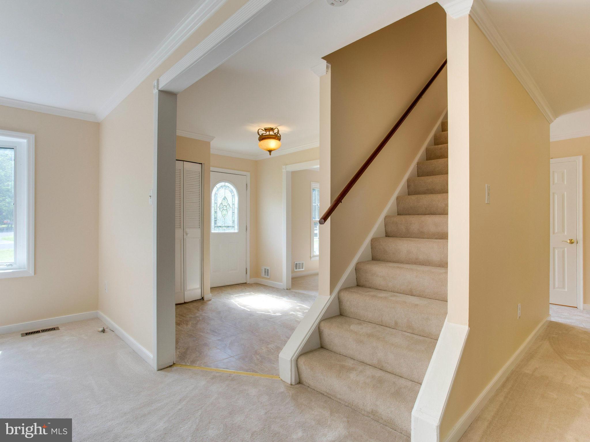 2308 St Bedes Court Reston, VA 20191 - Photo 4 of 30 a view of entryway and hall with wooden floor