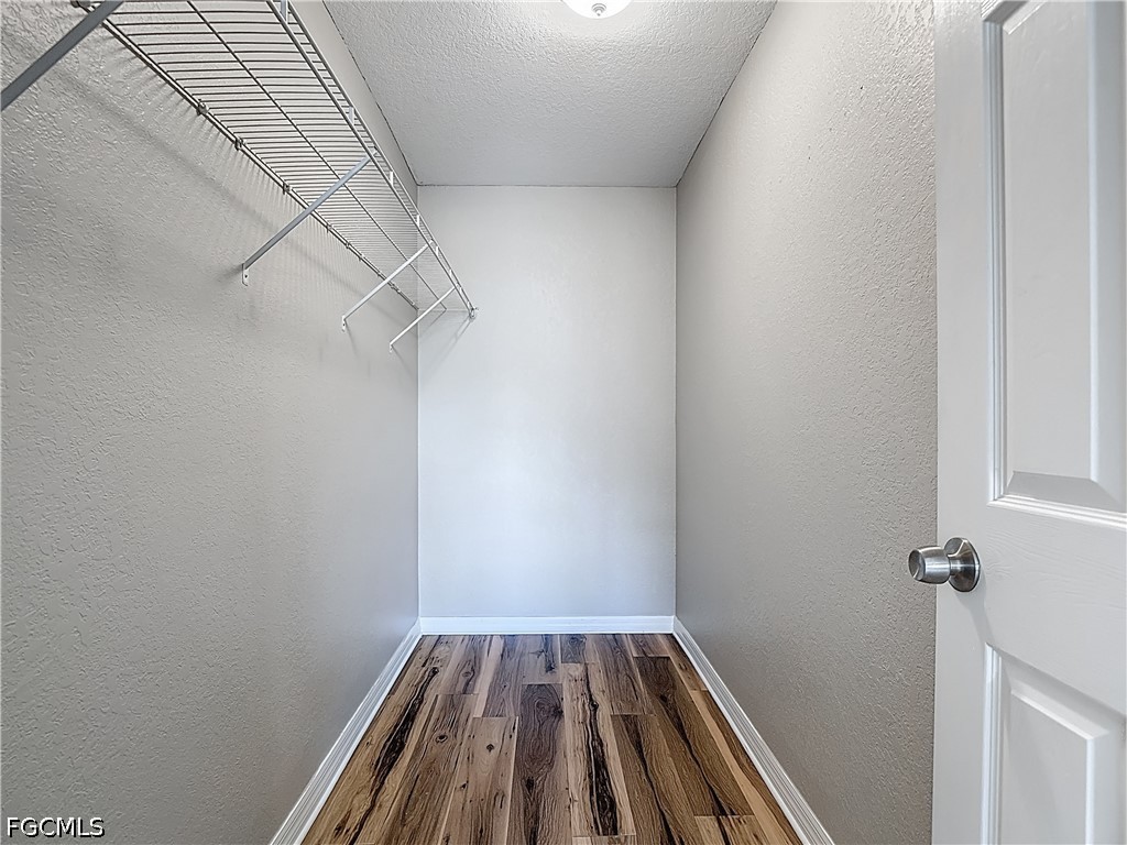 3713 20th Street Southwest Lehigh Acres, FL 33976 - Photo 11 of 23 a view of a room with wooden floor