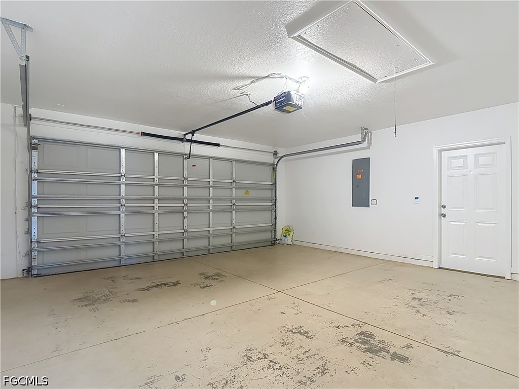 3713 20th Street Southwest Lehigh Acres, FL 33976 - Photo 21 of 23 a view of a garage