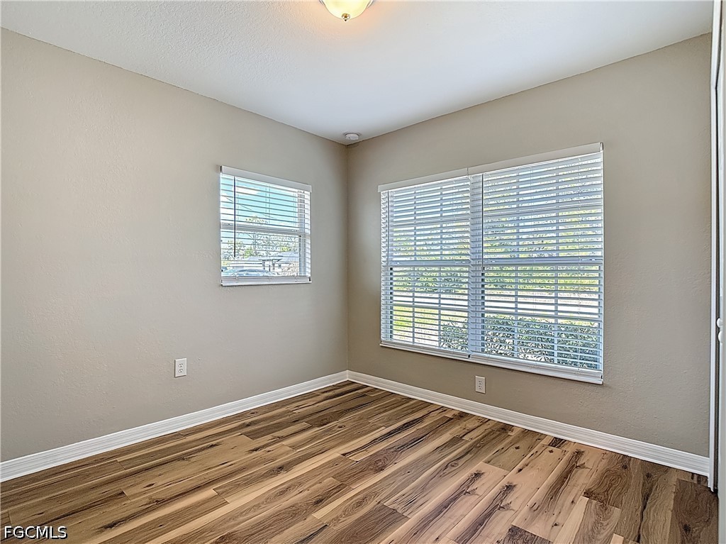 3713 20th Street Southwest Lehigh Acres, FL 33976 - Photo 7 of 23 a view of an empty room with a window