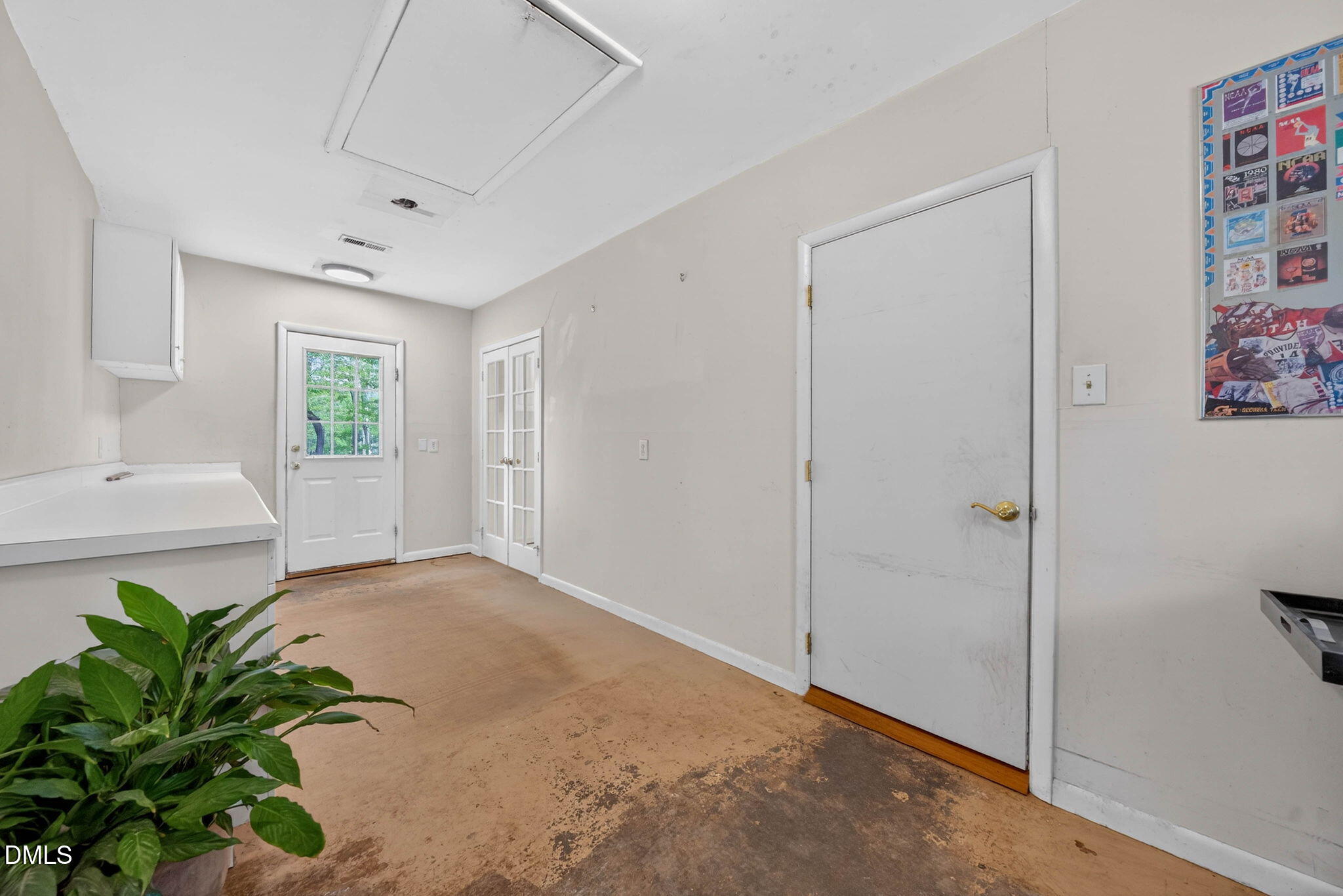 11617 Coachmans Way Raleigh, NC 27614 - Photo 46 of 79 This unfinished room next to the family room currently functions as an office and workshop. It has one vent providing conditioned air. Access to the attic is provided by pulldown stairs.