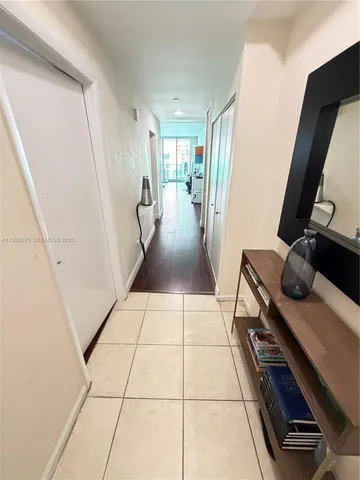 a view of kitchen with furniture and wooden floor