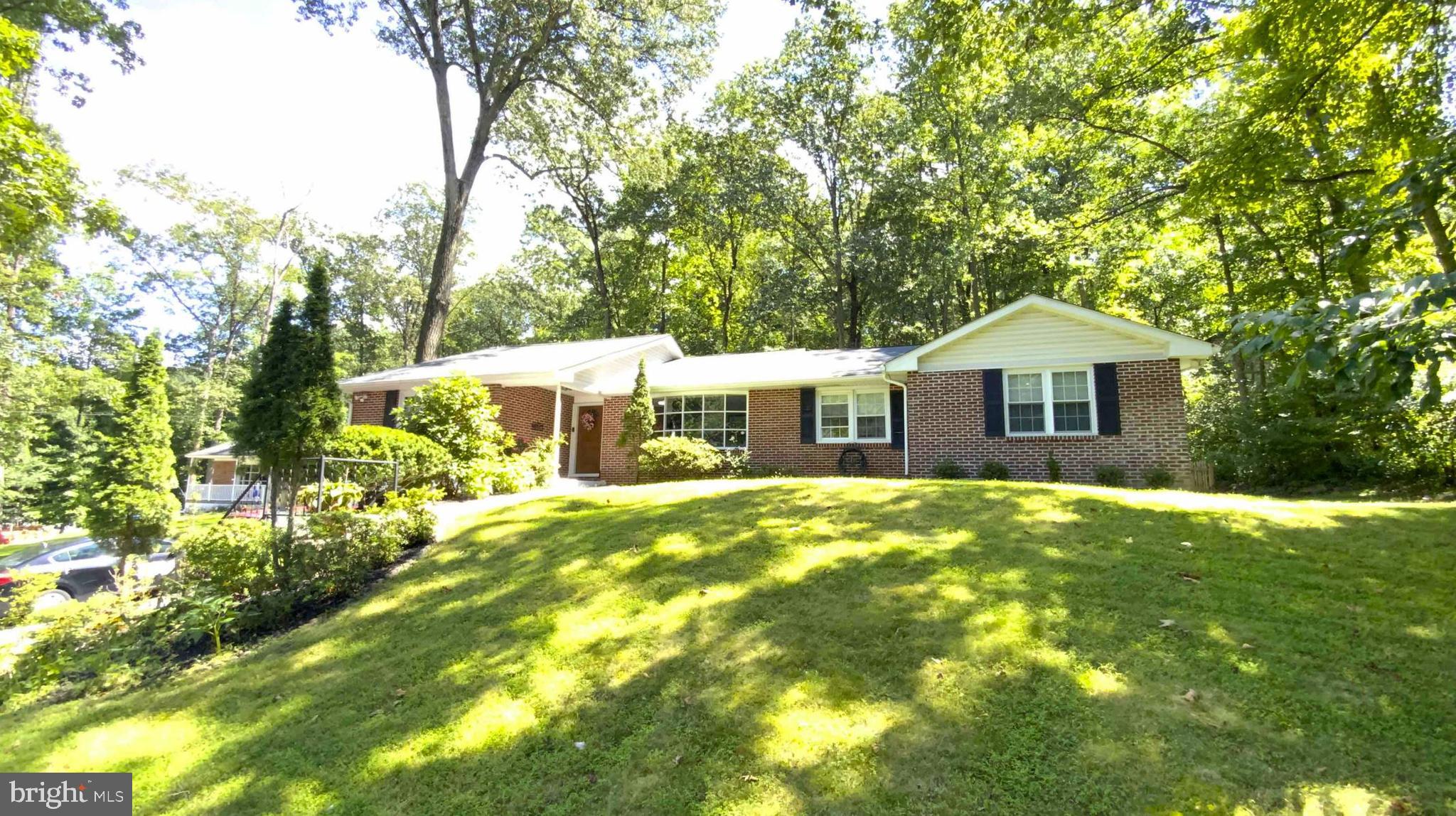 80 Spring Road Malvern, PA 19355 - Photo 68 of 68 Summer Time Front View