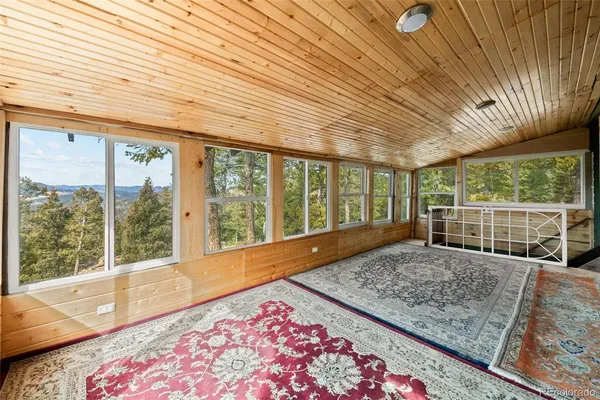 a view of a room with a large window