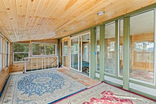 a view of an empty room with a large window