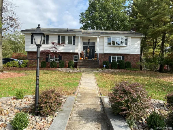 a front view of house with yard