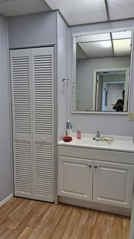 a view of a dining room with furniture and a chandelier