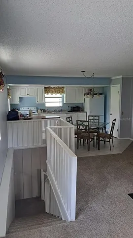 a view of a livingroom and dining room