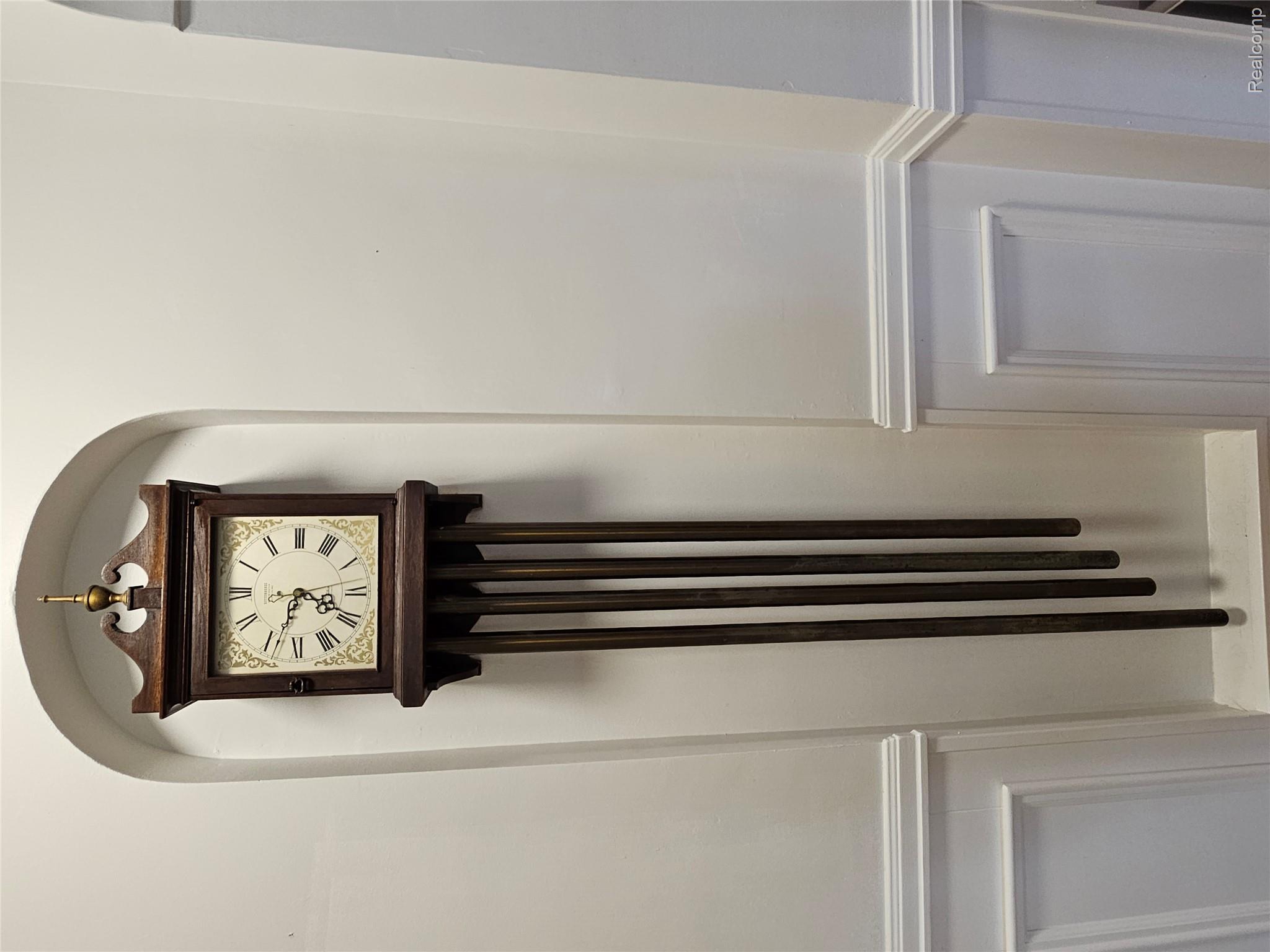 3377 Mackin Road Flint, MI 48504 - Photo 13 of 24 3777 MACKIN BR HALLWAY CLOCK.jpg