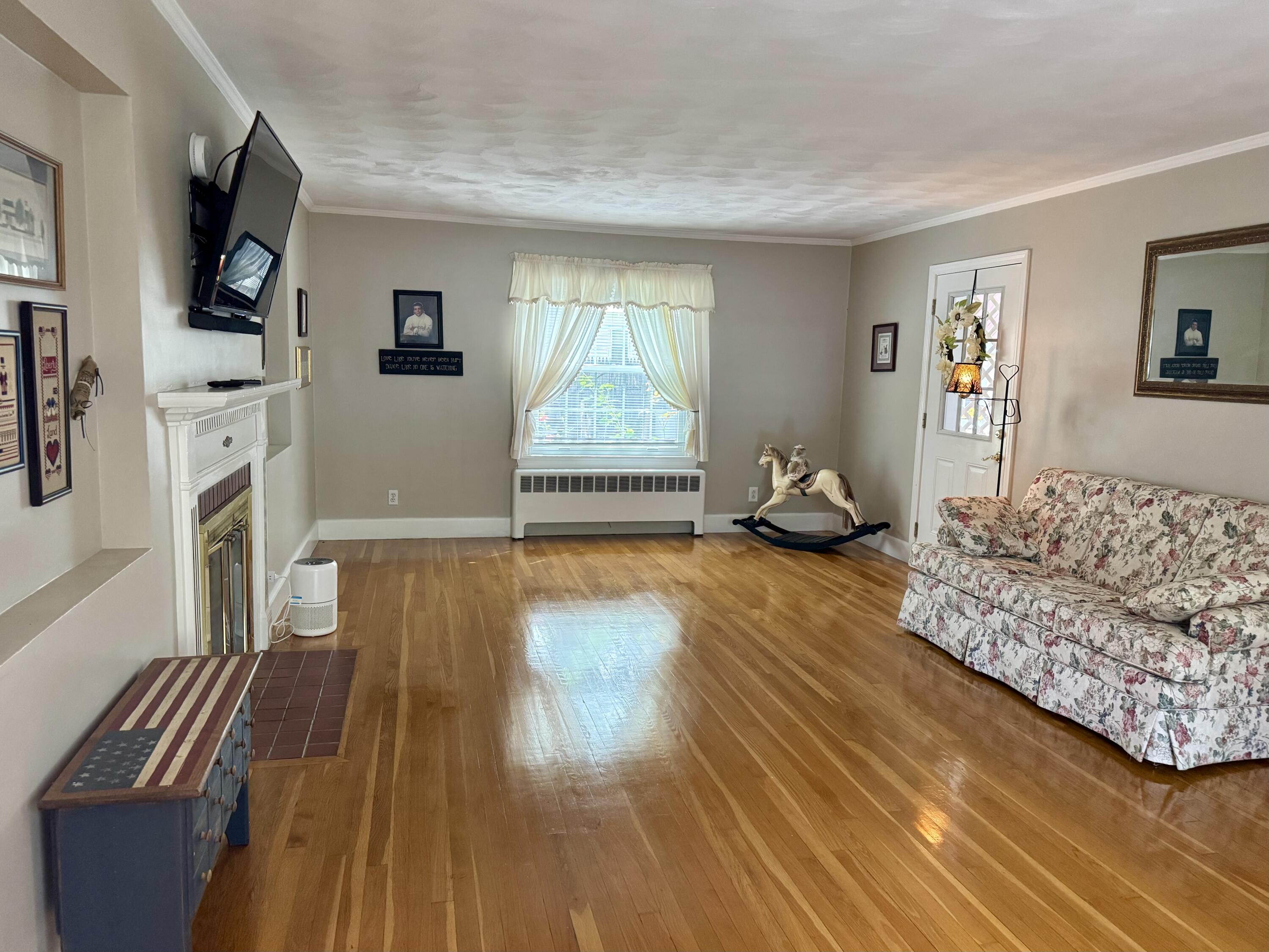 144 Silver Street Waterville, ME 04901 - Photo 9 of 26 right of foyer livingroom