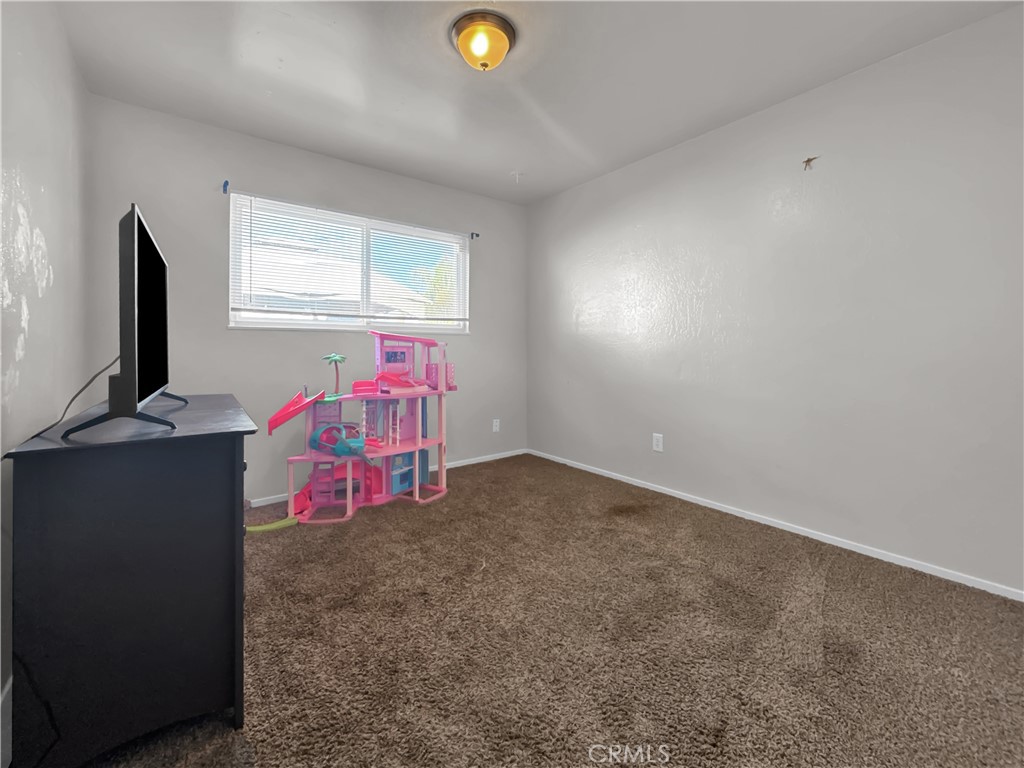 2846 North Parsons Merced, CA 95340 - Photo 23 of 29 a view of a room with gym equipment and windows