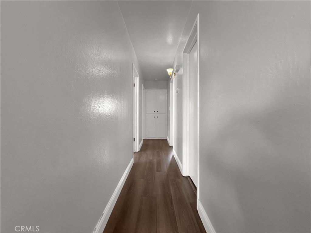 2846 North Parsons Merced, CA 95340 - Photo 24 of 29 a view of a hallway with wooden floor