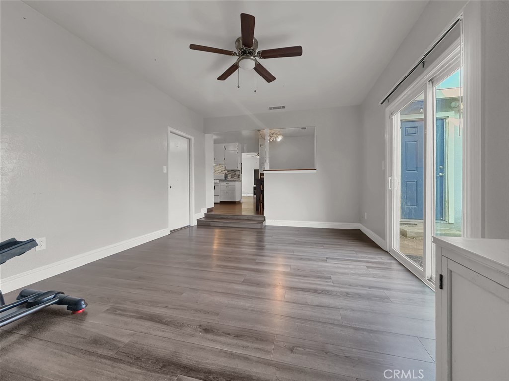 2846 North Parsons Merced, CA 95340 - Photo 6 of 29 a view of empty room with wooden floor and ceiling fan