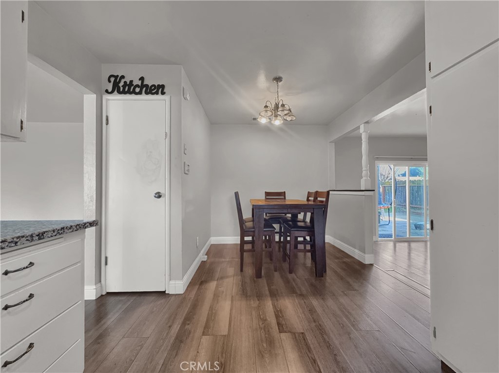 2846 North Parsons Merced, CA 95340 - Photo 9 of 29 a view of a dining room with furniture and wooden floor