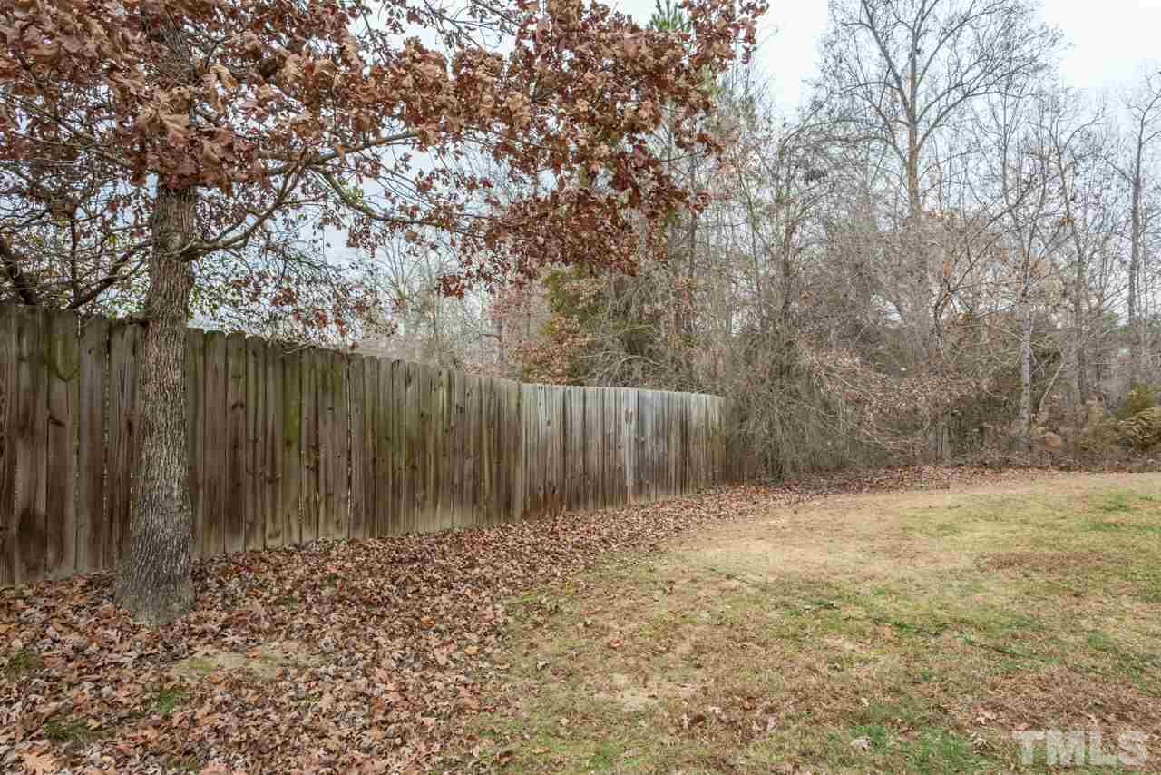 3404 Kernstown Drive Raleigh, NC 27610 - Photo 17 of 21 a backyard of a house