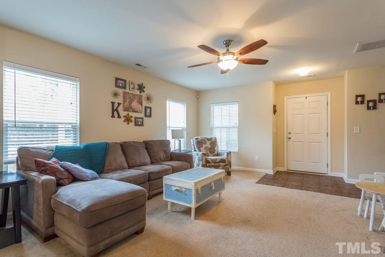 3404 Kernstown Drive Raleigh, NC 27610 - Photo 3 of 21 a living room with furniture and a window