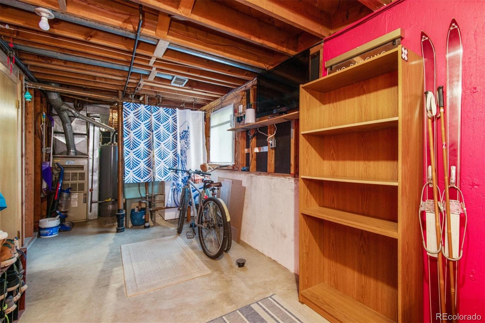 8633 West 44th Place Wheat Ridge, CO 80033 - Photo 24 of 30 a view of storage and utility room