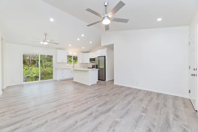 a bedroom with bed and window