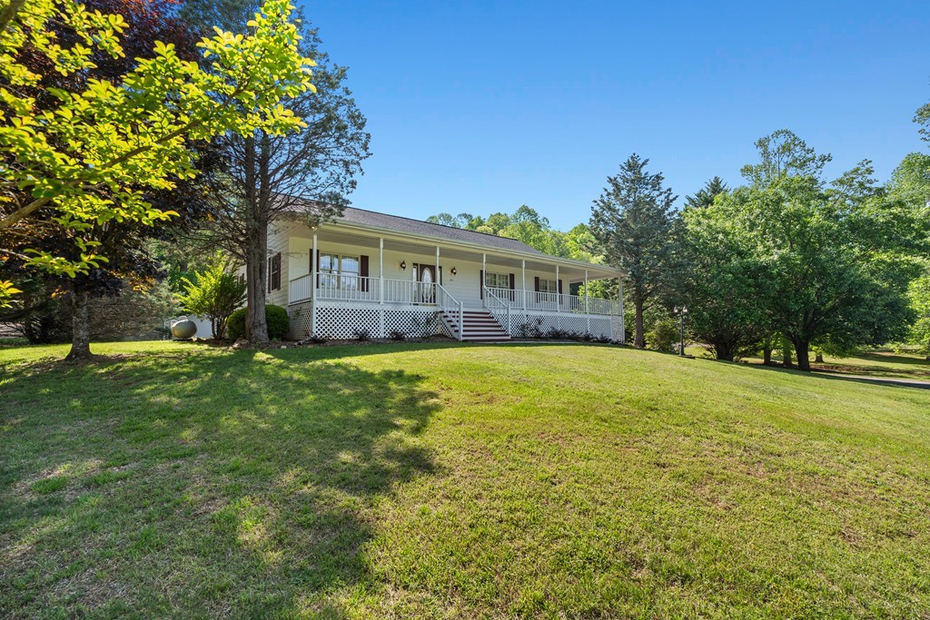 2421 Settlers Ridge Road Hiawassee, GA 30546 - Photo 11 of 46 a view of a house with a big yard
