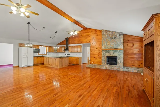 a view of a livingroom with wooden floor
