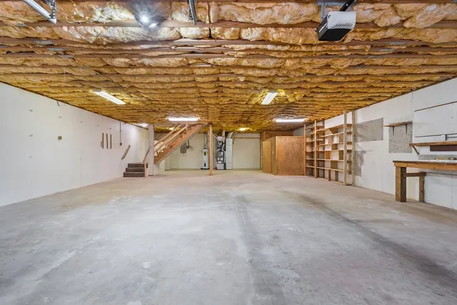 a view of an empty room with stairs