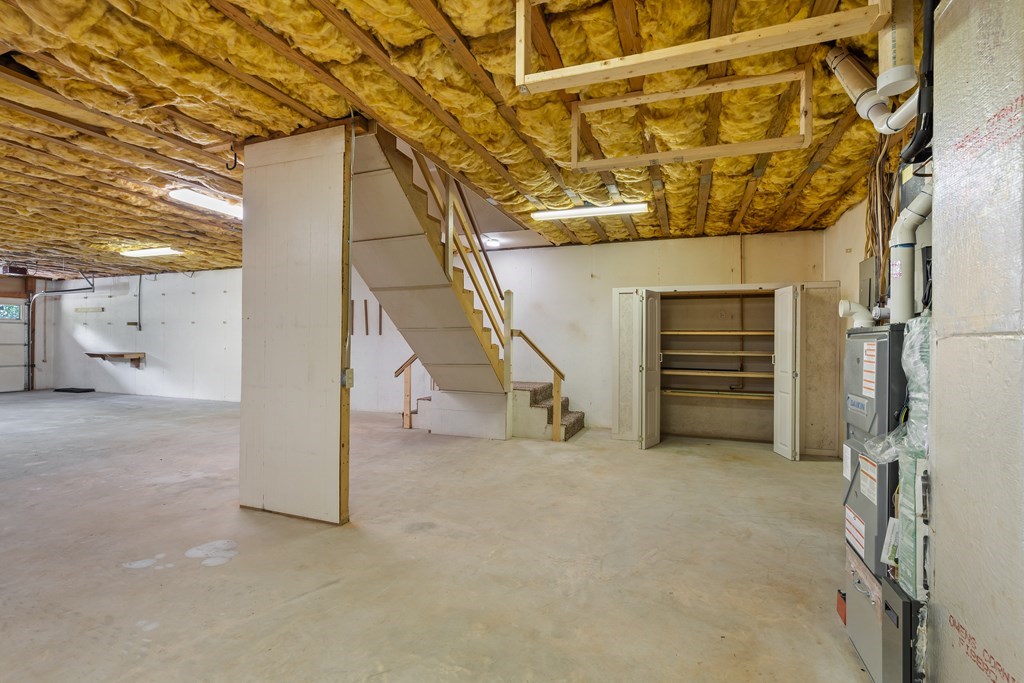 2421 Settlers Ridge Road Hiawassee, GA 30546 - Photo 38 of 46 a view of an empty room with stairs