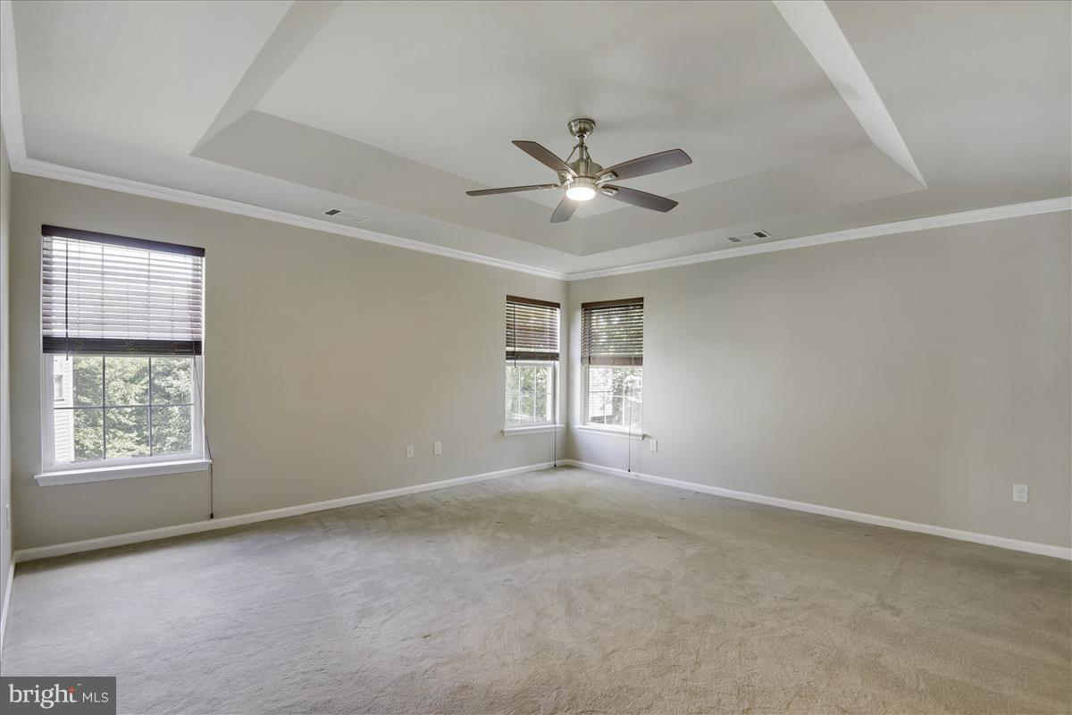 12902 Summit Ridge Terrace Germantown, MD 20874 - Photo 21 of 30 a view of empty room with windows