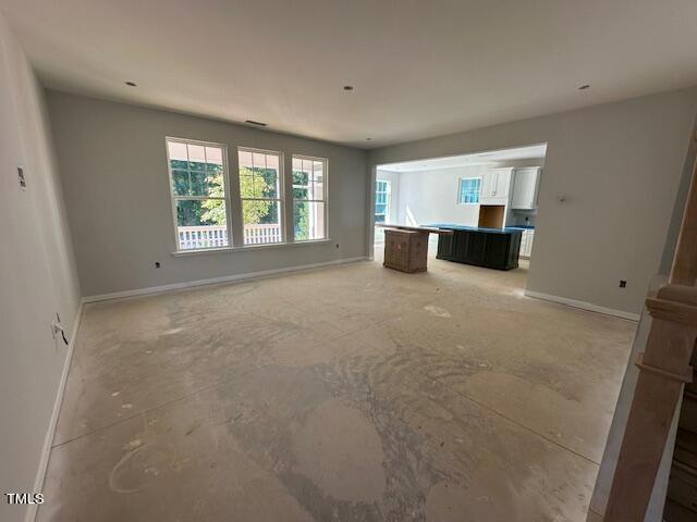7701 Litcham Drive Raleigh, NC 27615 - Photo 16 of 58 a view of an empty room with a window
