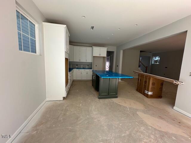 7701 Litcham Drive Raleigh, NC 27615 - Photo 25 of 58 a view of a kitchen with a sink