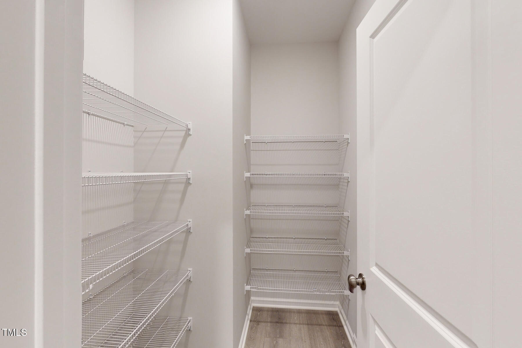 7701 Litcham Drive Raleigh, NC 27615 - Photo 26 of 58 a view of walk in closet