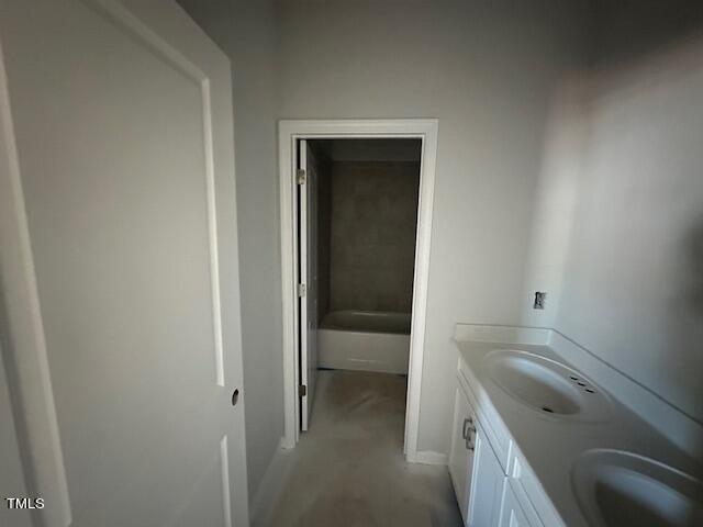 7701 Litcham Drive Raleigh, NC 27615 - Photo 44 of 58 a room with a sink and cabinets