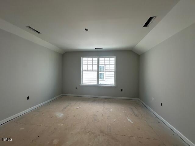 7701 Litcham Drive Raleigh, NC 27615 - Photo 47 of 58 an empty room with a window