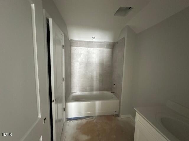 7701 Litcham Drive Raleigh, NC 27615 - Photo 51 of 58 a bathroom with a bathtub and a shower